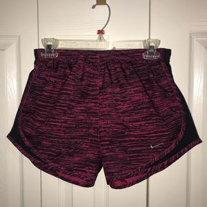 Pink Nike dri-fit running shorts